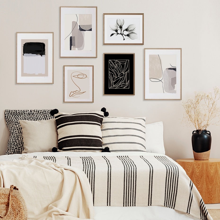 Abstract wall art set on bedroom wall.