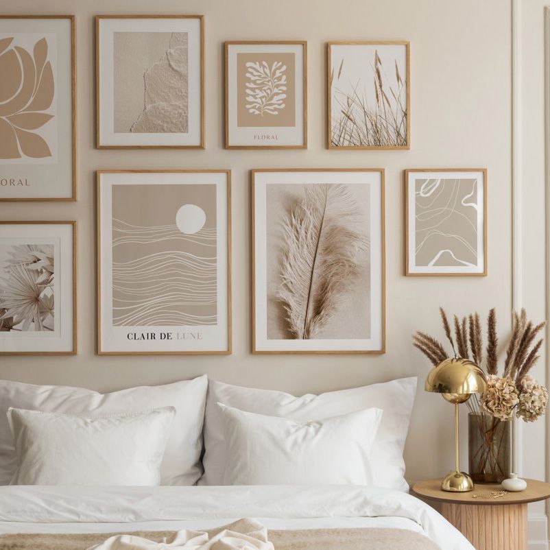Beige canvas wall art set in bedroom.