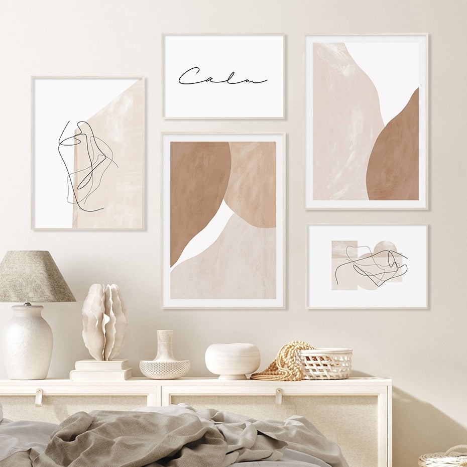 Brown and cream wall art on beige wall.