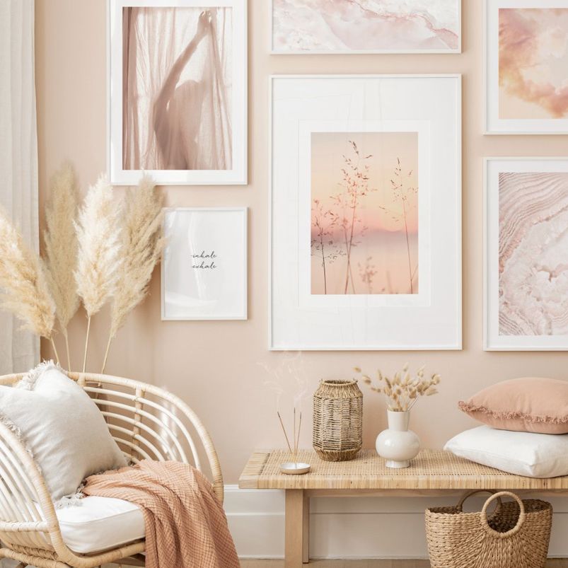 Peach wall art on living room wall.