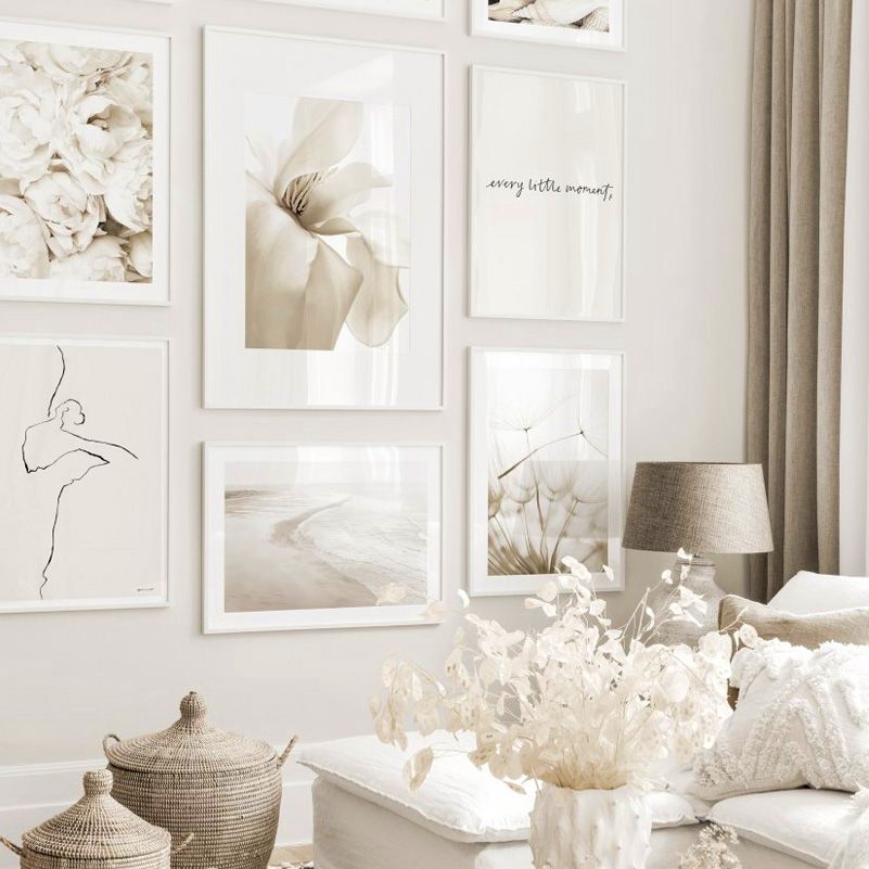 Beige wall art set on living room wall.