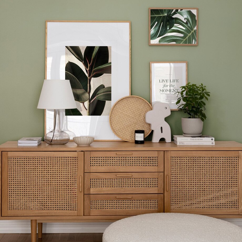 Floral plant wall art on side board.
