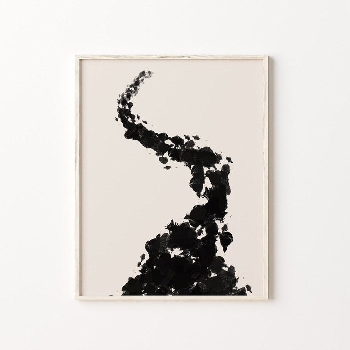Black and beige abstract poster in frame.