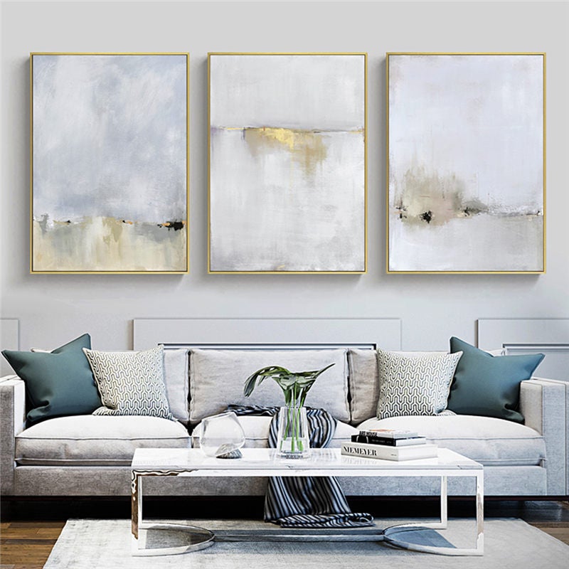 Gold Myst Canvas Prints on white living room wall.