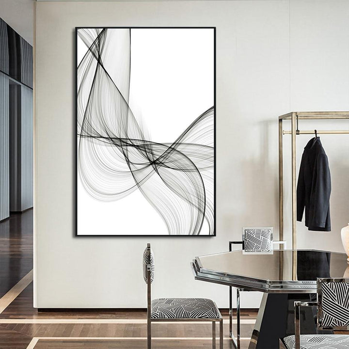 Minimalist canvas poster on dining area wall.