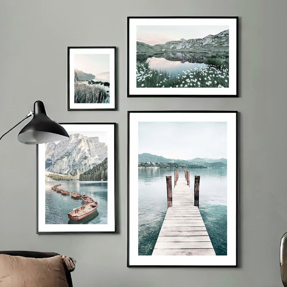 4 piece nature prints on green wall.