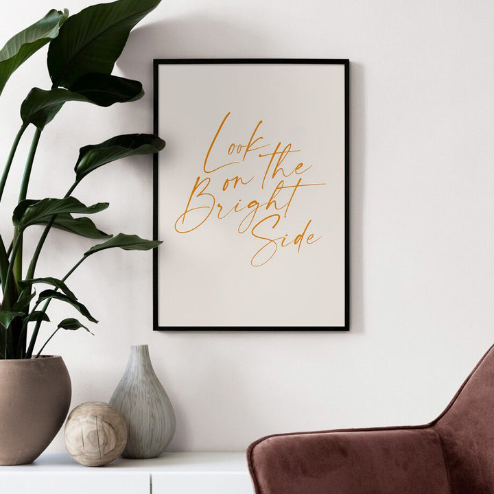 Positive quote canvas poster on lounge wall.