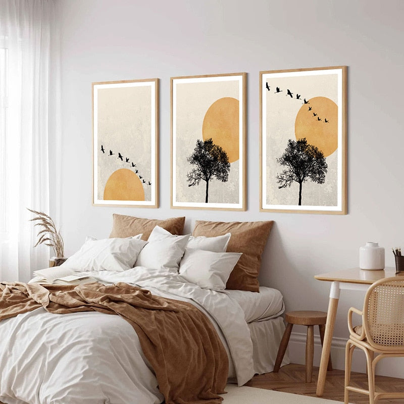 Abstract sunset wall art set in bedroom.