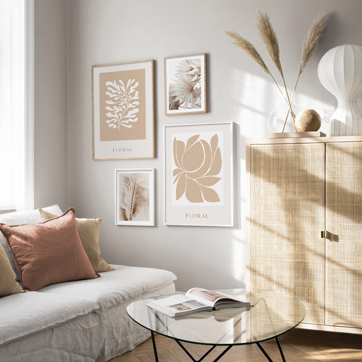 Beige abstract canvas wall art on white wall.