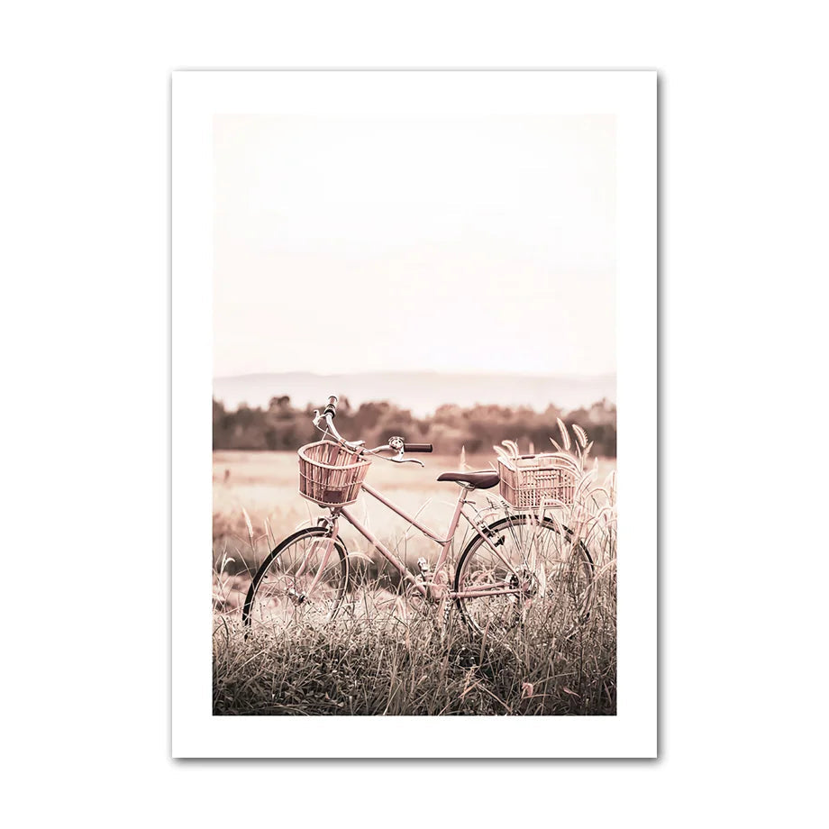 Sepia-toned bicycle with baskets in a field on a white background