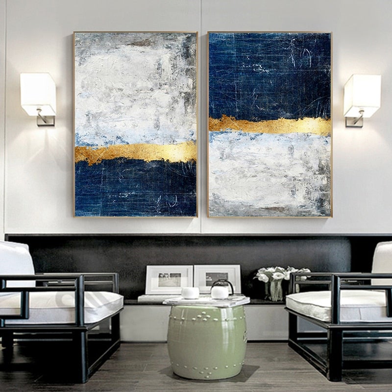 Blue and gold wall art in living room.