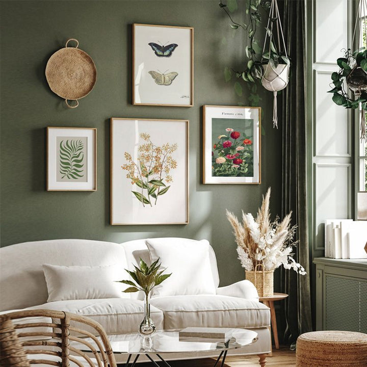 Botanical wall art set in living room.