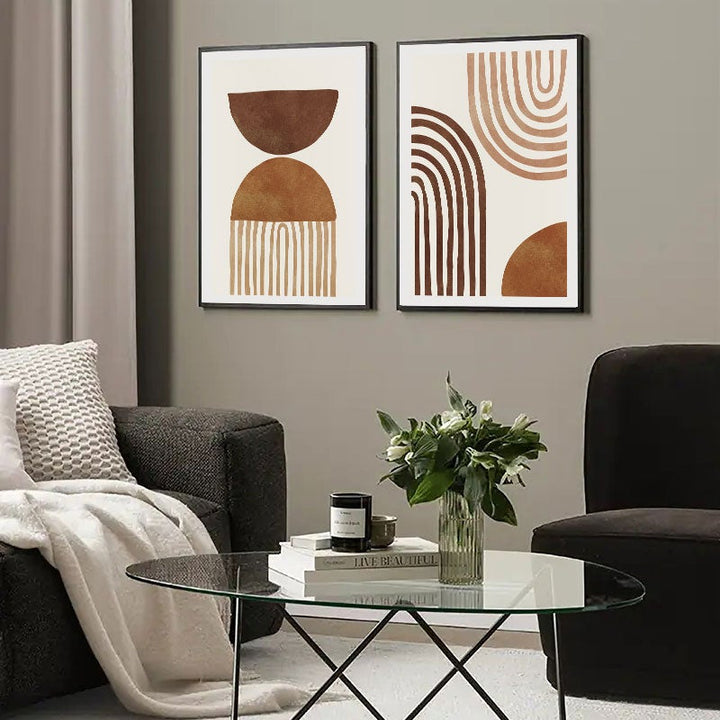 Brown abstract wall art in grey living room.