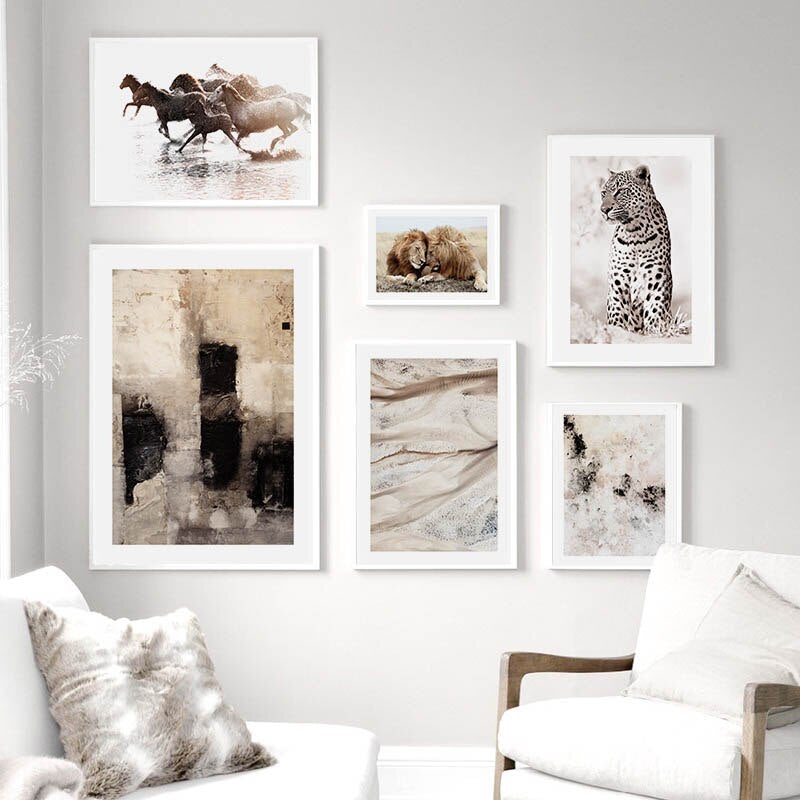 Brown and black wall art set in living room.