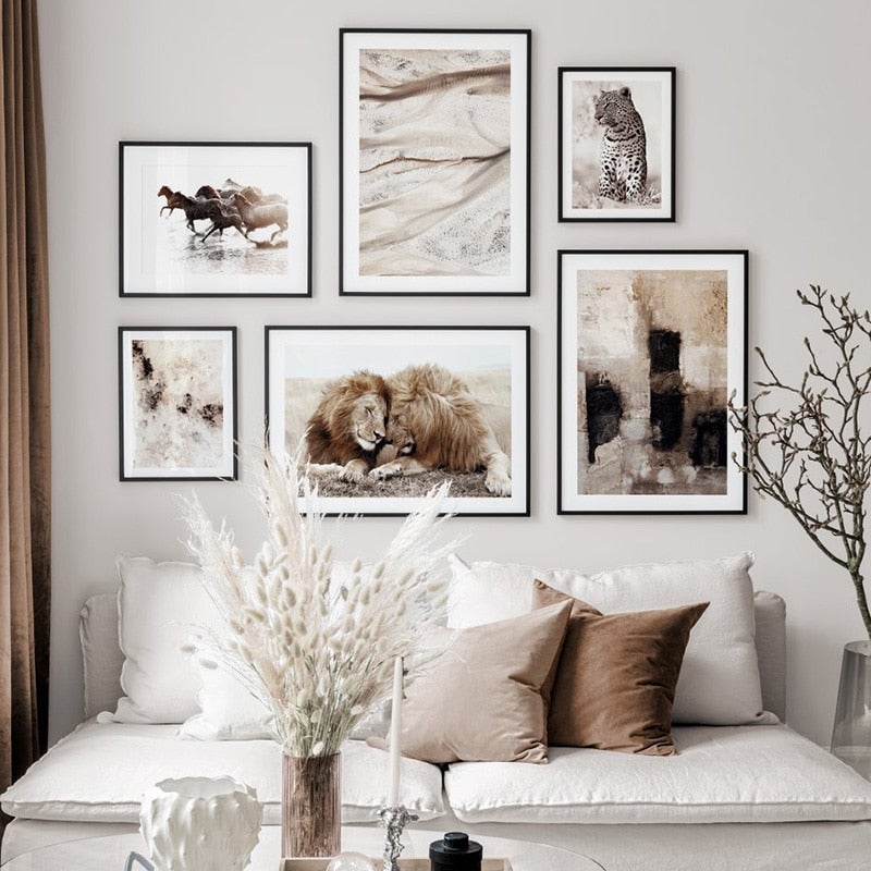 Brown and black wall art set on beige living room wall.