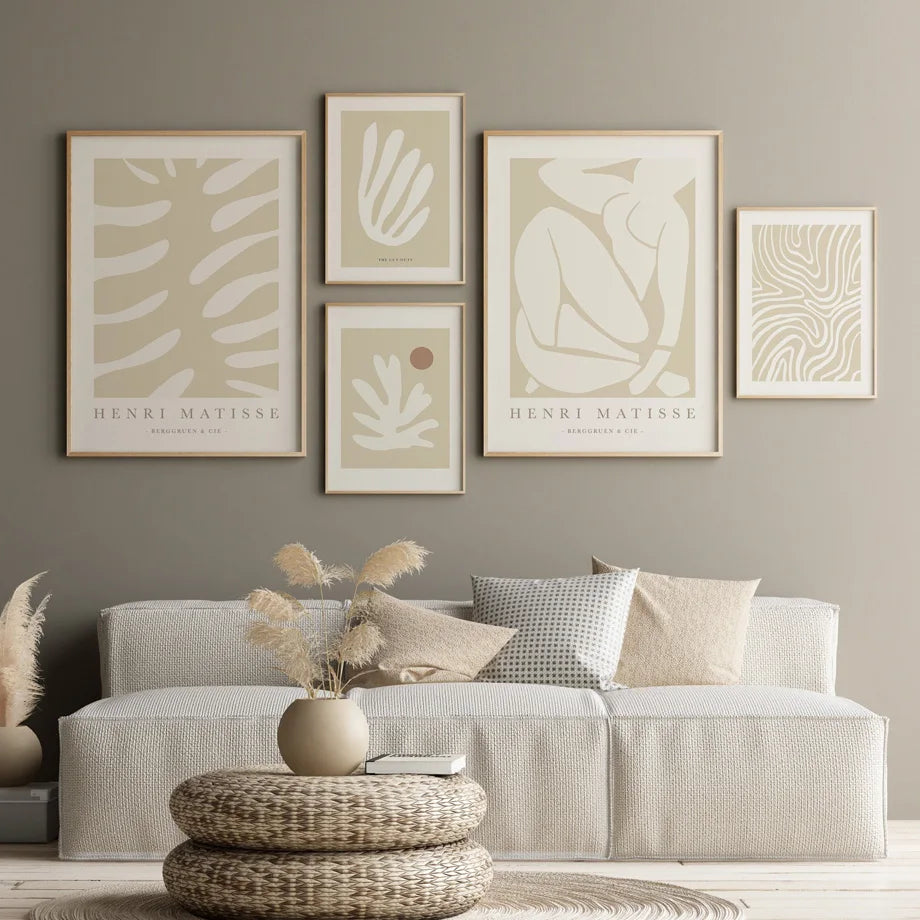 Cala collection canvas prints styled as gallery wall above beige sofa