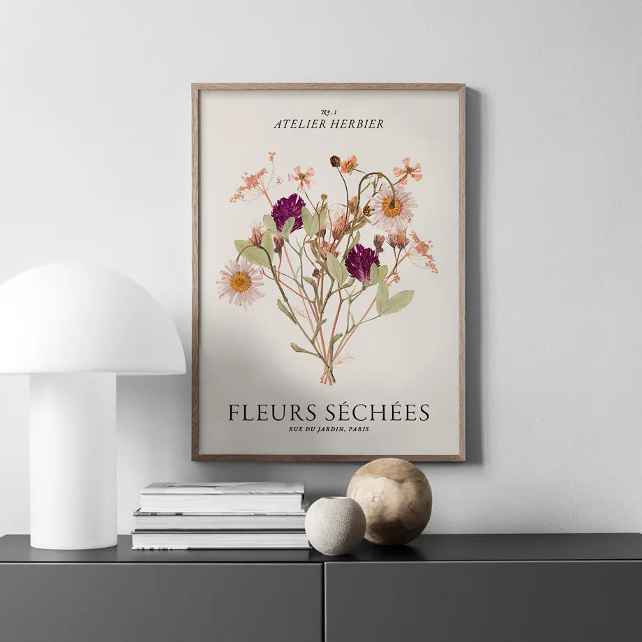 Canvas poster of a floral print on a wall above sideboard.