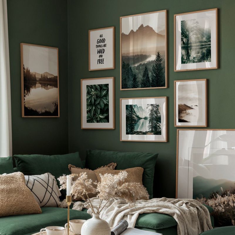 Forest wall art set on green wall.