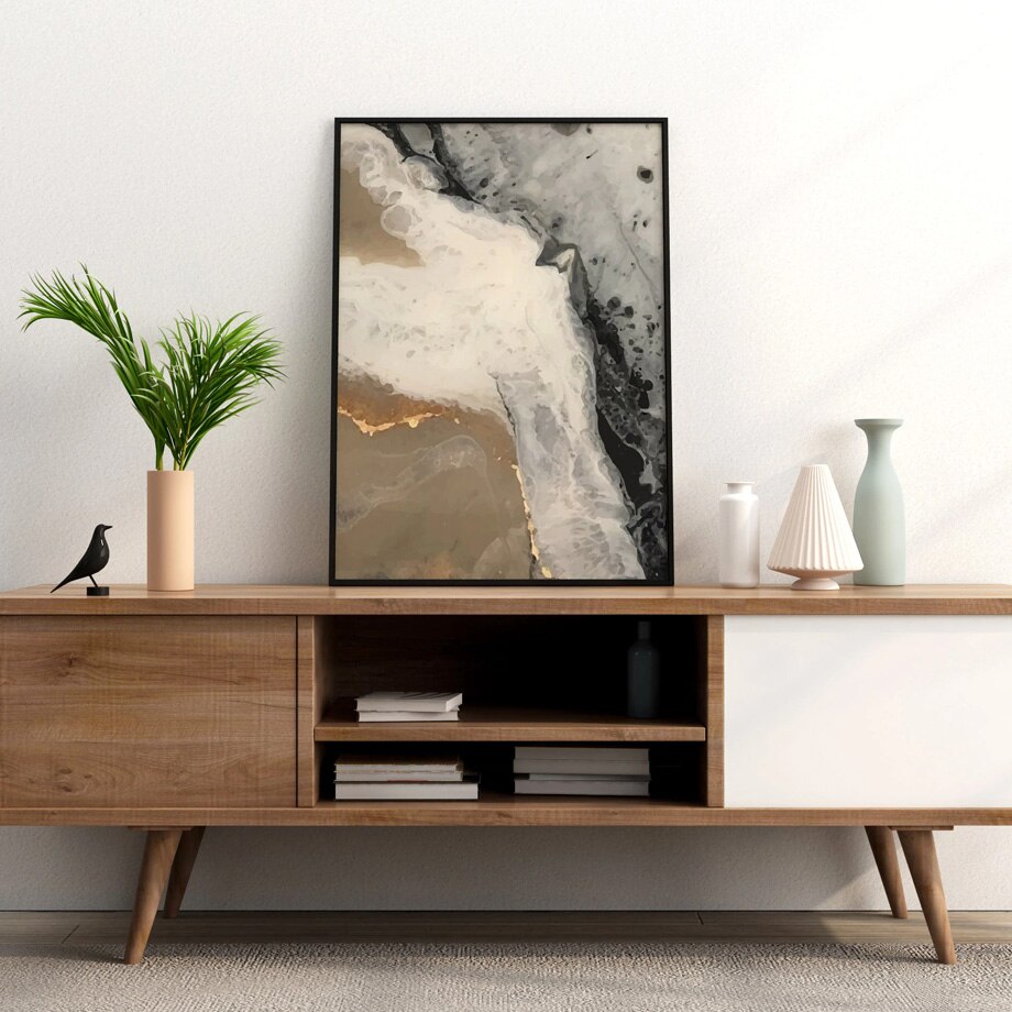 Neutral abstract poster on sideboard.