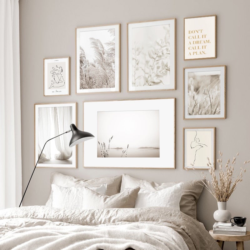 Neutral canvas poster set on bedroom wall above bed.