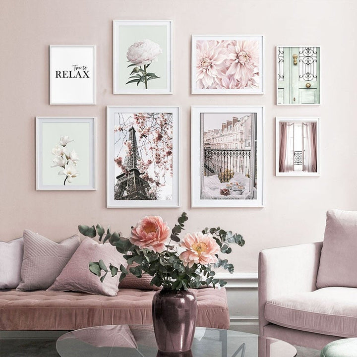Paris wall art set on pink living room wall.