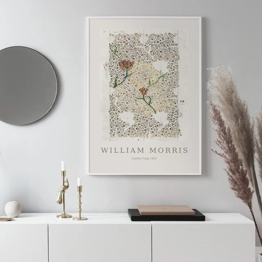 Absract flower print on white wall above sideboard.