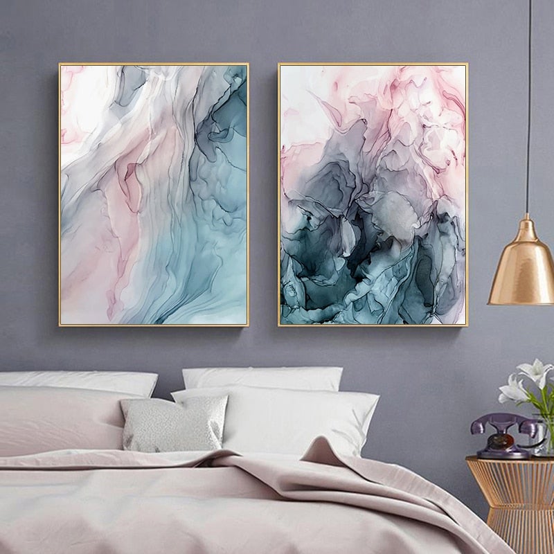 Turquoise and pink wall art poster set above bed on bedroom wall.