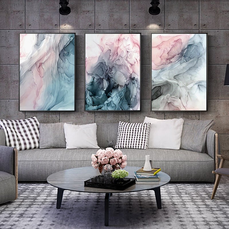 Turquoise and pink wall art set on grey living room wall.