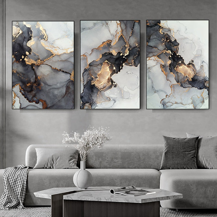 Black and gold gallery on living room wall above sofa