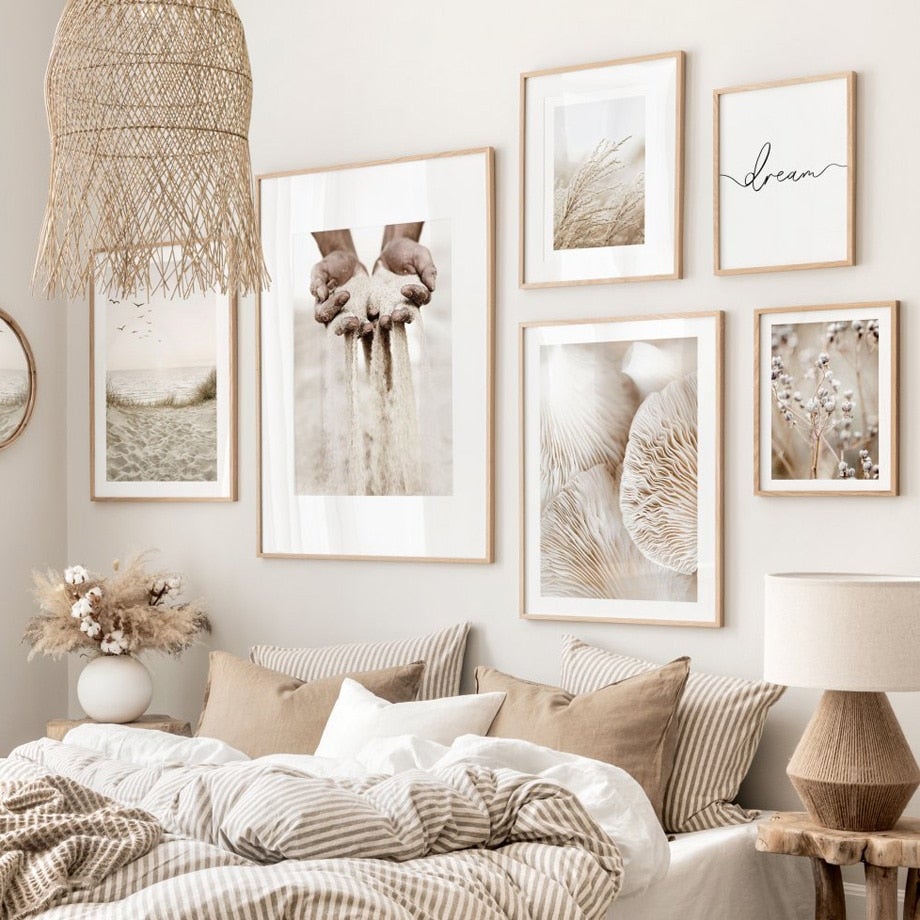 Beige and white nature canvas print set on bedroom wall.