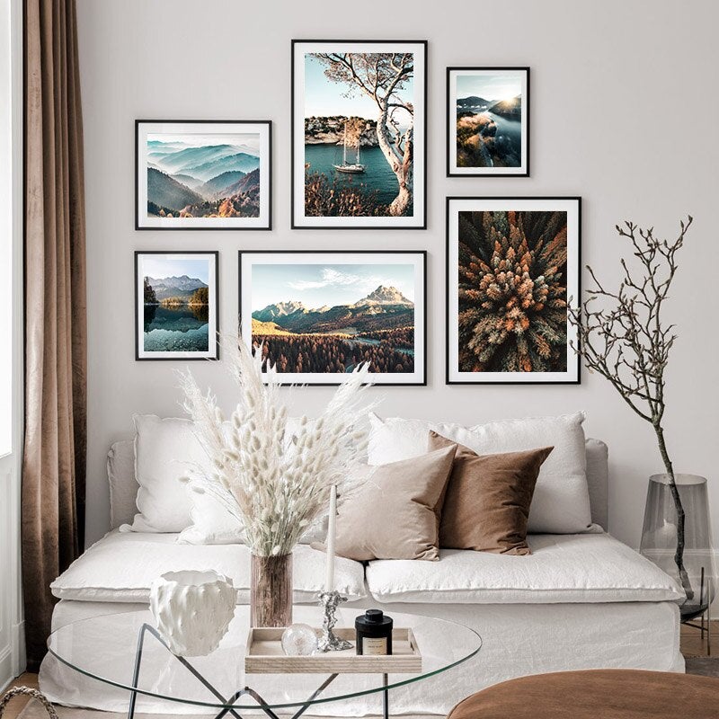 Forest photography wall art gallery set on white living room wall.