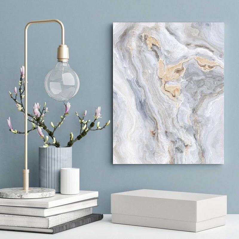 Grey and gold canvas poster on green wall.