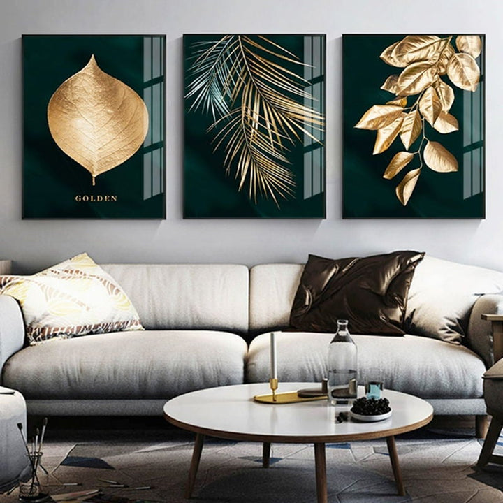 Leaves of Gold canvas prints on wall above sofa.