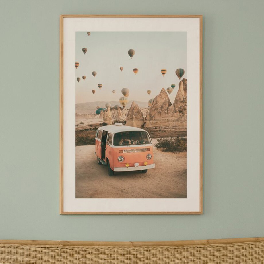 Mini van canyon with air balloons canvas poster with frame on wall.